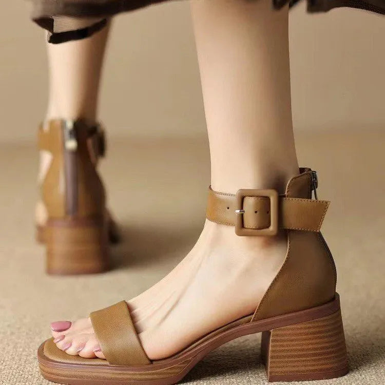 Women's white retro platform high heels with an ankle strap, shown from the side.