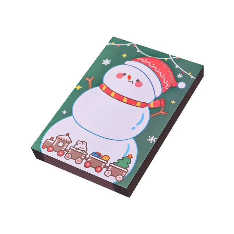 Christmas sticky notes pad with festive designs including elf, gift, sled, Santa Claus, bear, and snowman