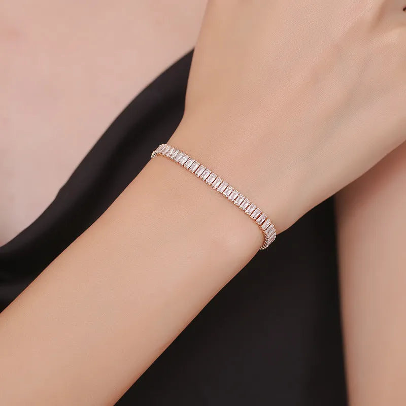 Rectangular brass women's bracelet with full diamond zircon inlays in champagne gold colour