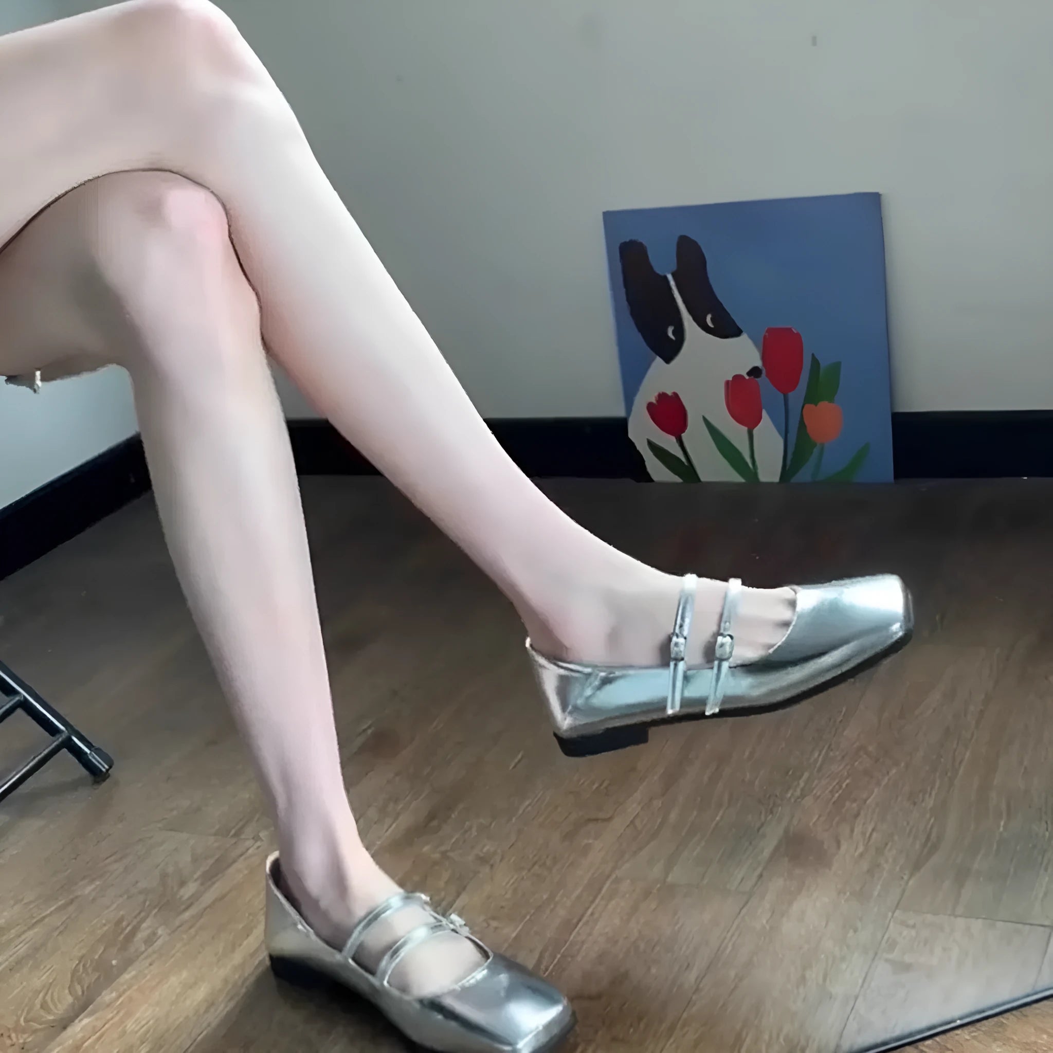 Women's silver leather ballet flats with cross-strap buckle and round toe