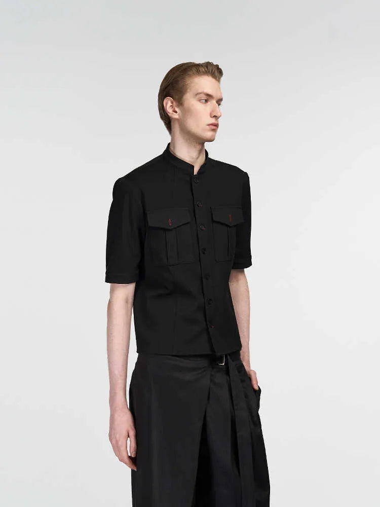 Black loose fit hunting shirt with half sleeves, shirt collar, and single-breasted placket