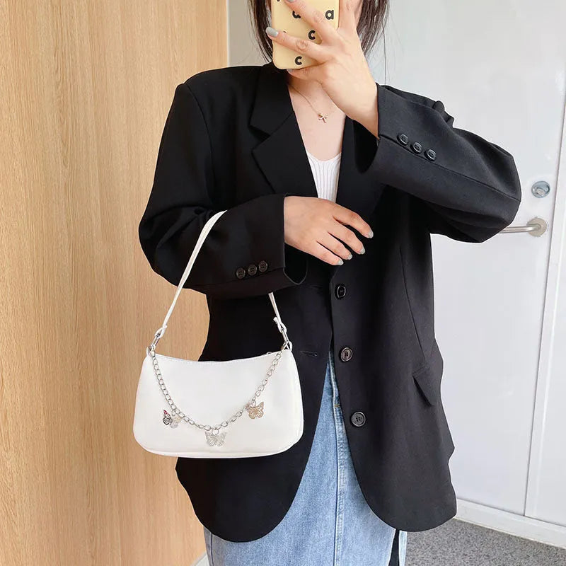 Horizontal square butterfly chain underarm bag in four colour options