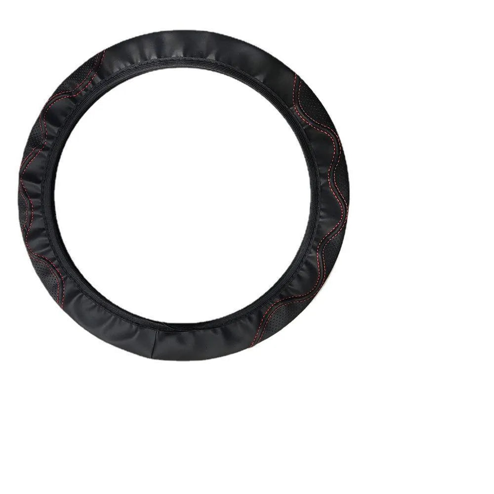 Black elastic steering wheel cover with corrugated texture, stretched to show fit on a 37-38cm wheel.