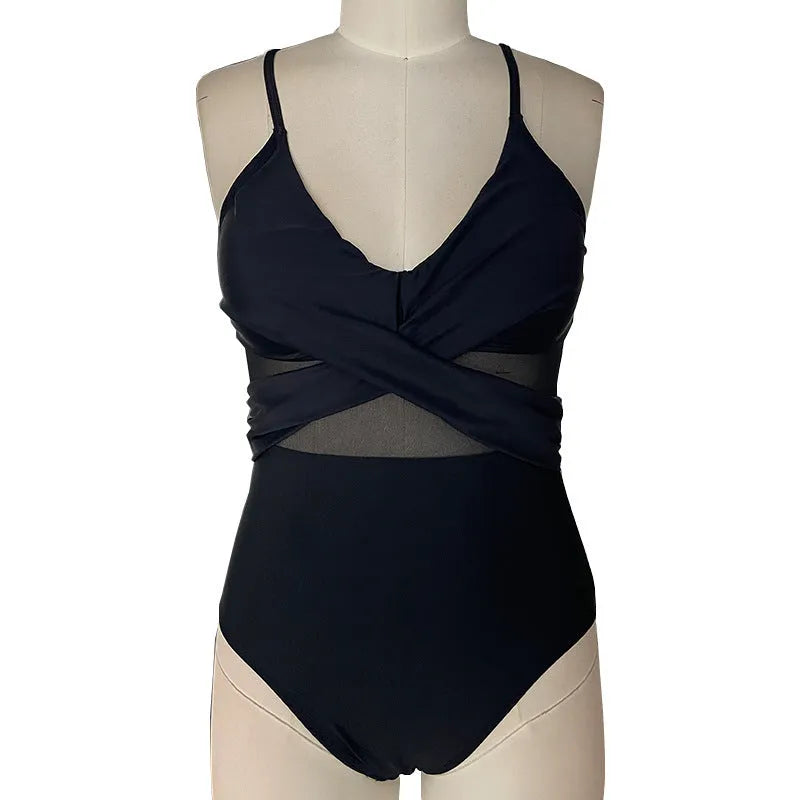 Women's black mesh spliced backless one-piece swimsuit on model