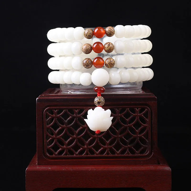 White jade Bodhi beads long bracelet with 6x8mm beads, showing various style options.