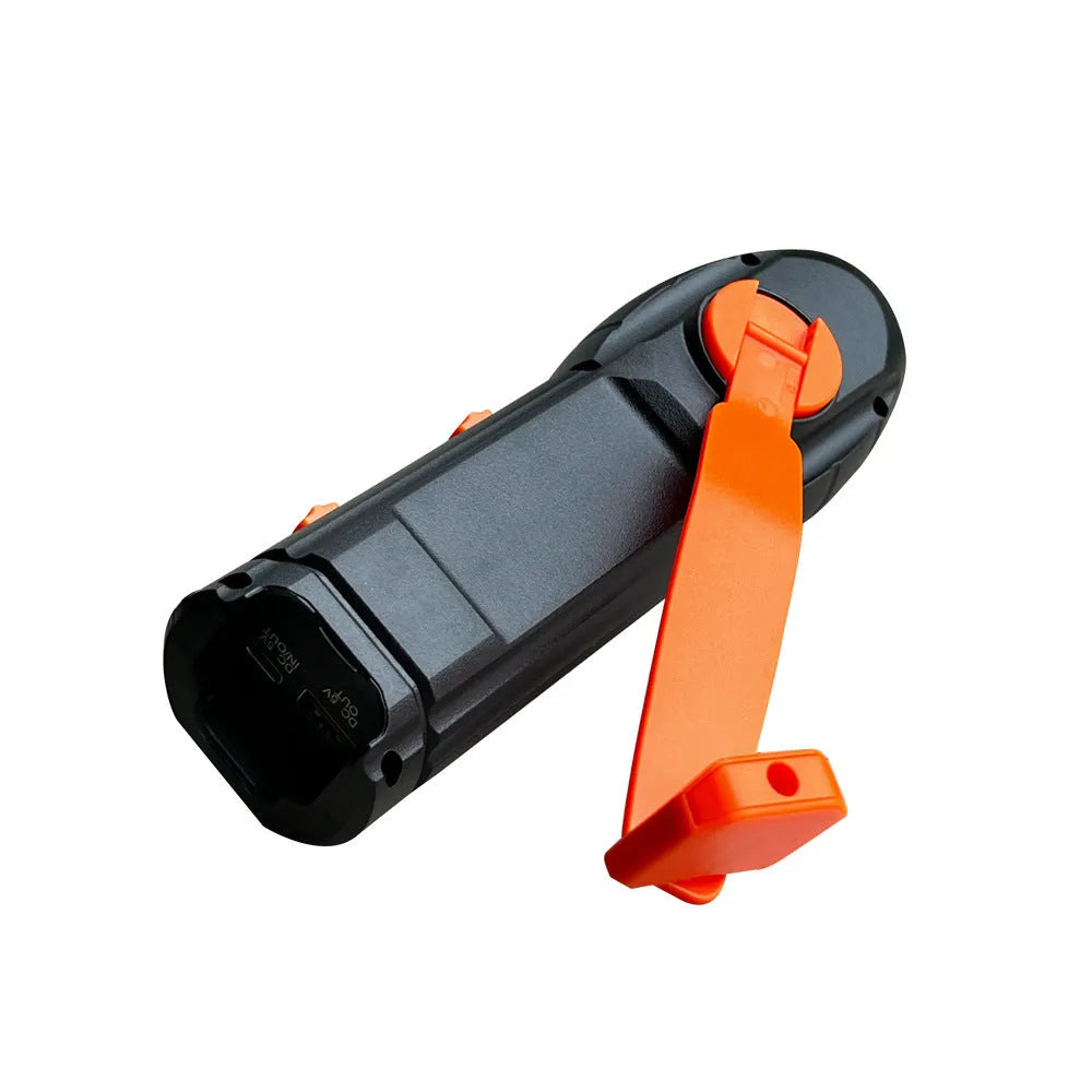 Hand-cranked emergency radio flashlight with USB charging port built-in speaker and manual tuning dial in black