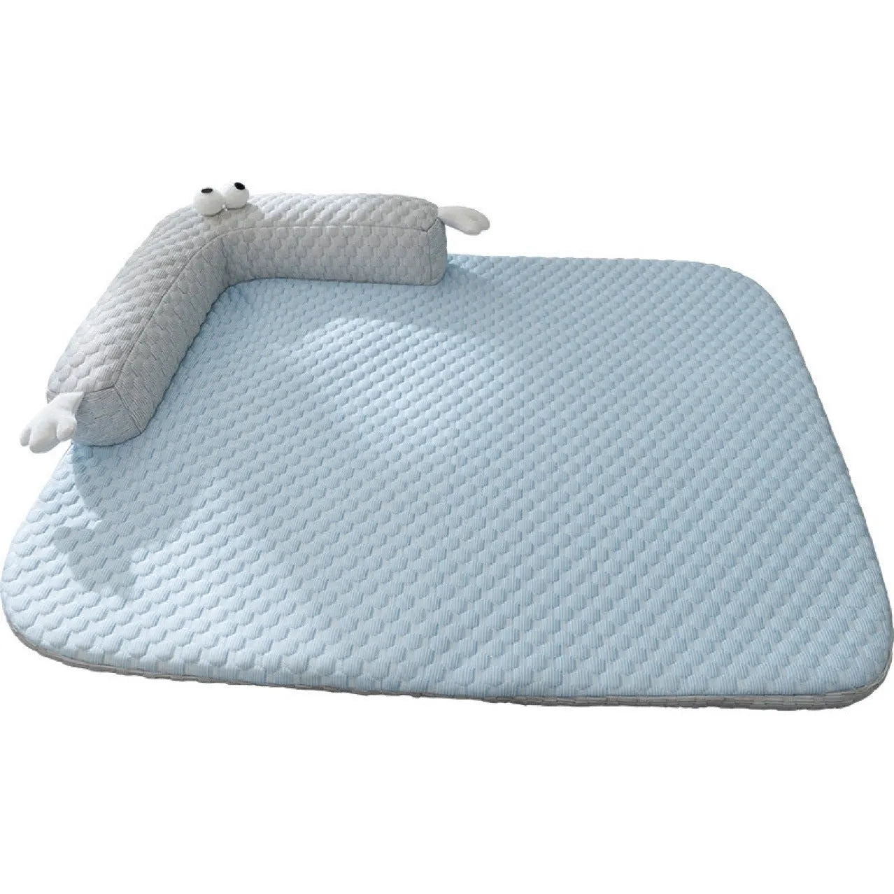 Blue pet cushion with large monster face design for dogs and cats on a wooden floor.