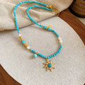 Freshwater pearl necklace with electroplated sun pendant on 41-50 cm clavicle chain
