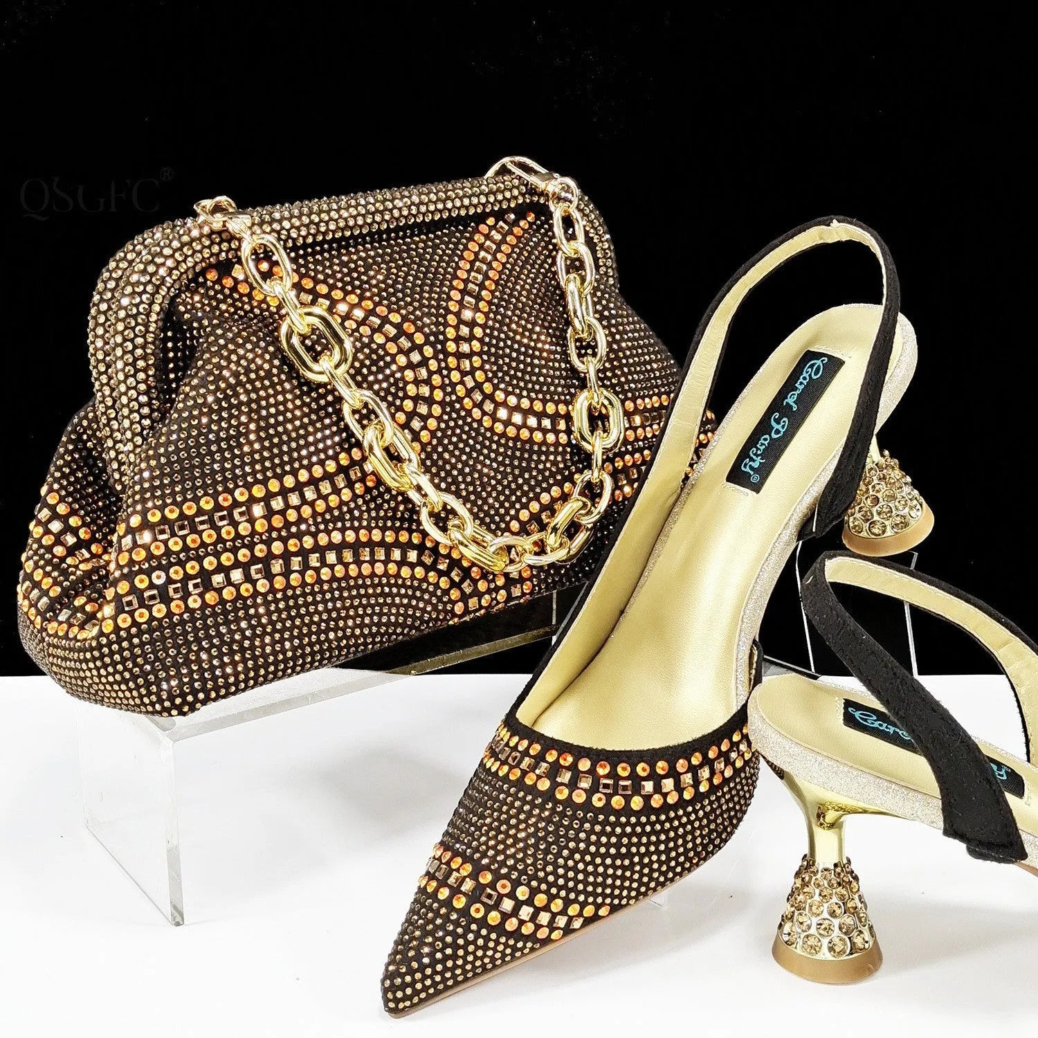 Women's pointed toe high heels with rhinestones and a matching small bag, shown in one of eight available colours.