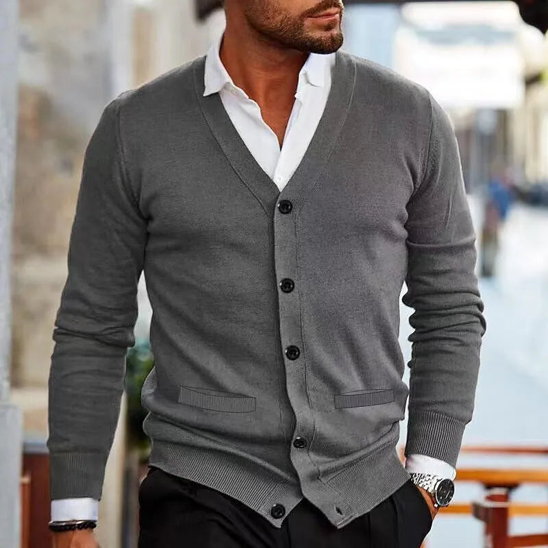 Men's slim fit acrylic cardigan sweater coat in dark grey, shown open over a t-shirt.