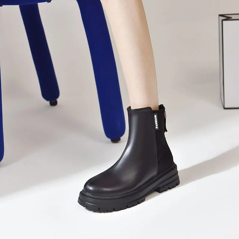 Women's British style platform Martin boots in solid black with rubber sole, low tube design, sizes 35-43