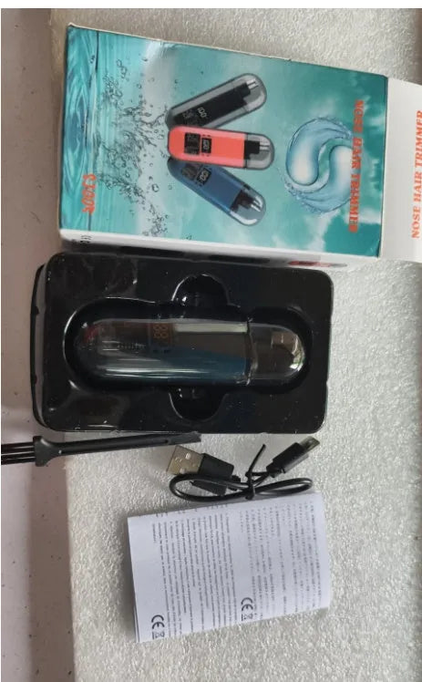 Rechargeable nose hair trimmer with digital display in black, blue, or orange colours