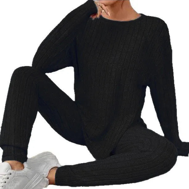 Sunken stripe two-piece lounge set in polyester available in black or blue colours, sizes 1XL to 5XL