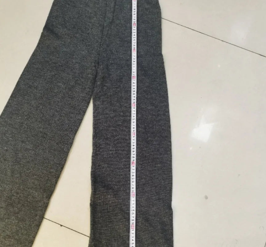 Women's side-slit sweater suit with matching trousers in solid colour acrylic fabric