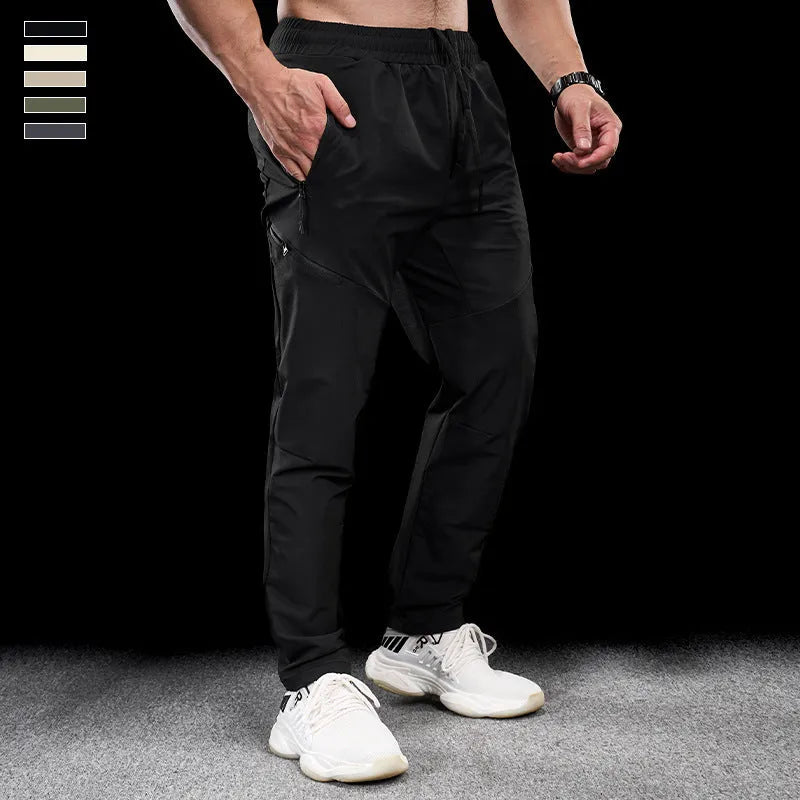Men's waterproof workout pants in quick-drying nylon fabric for sports and fitness activities