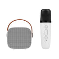 White portable Bluetooth speaker with wireless audio and microphone for hands-free calls.