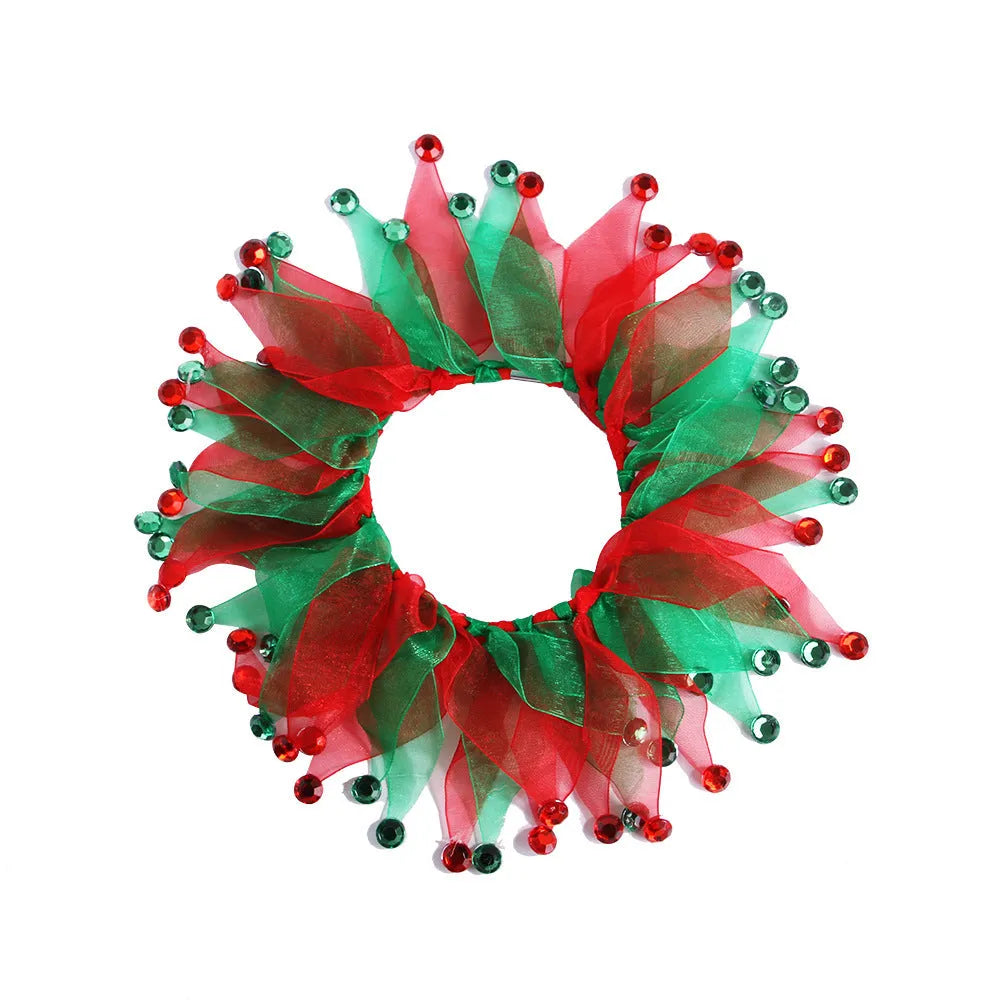 Colourful tie-dye dog collar in green, blue, Halloween, and Christmas styles on a white background.