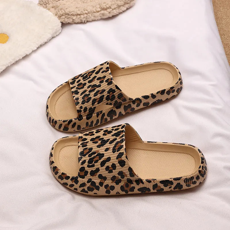 Women's leopard print EVA slippers with thick sole on a white background.