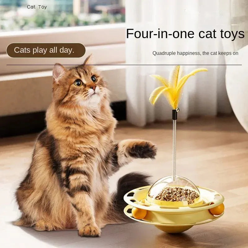 Cat UFO tumbler turntable toy with blue plastic base and feather attachment on a white background, pet entertainment product