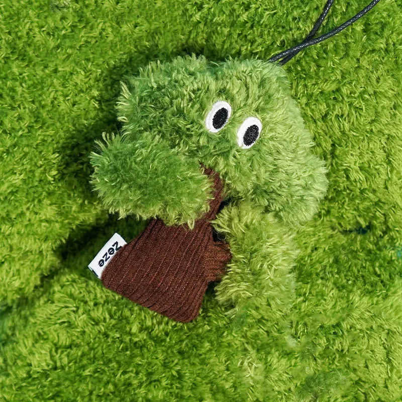 Green pine tree shaped cat toy with hanging loop for biting and interactive play