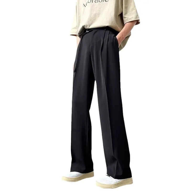 Black loose fit wide leg casual trousers with straight hem on a mannequin.
