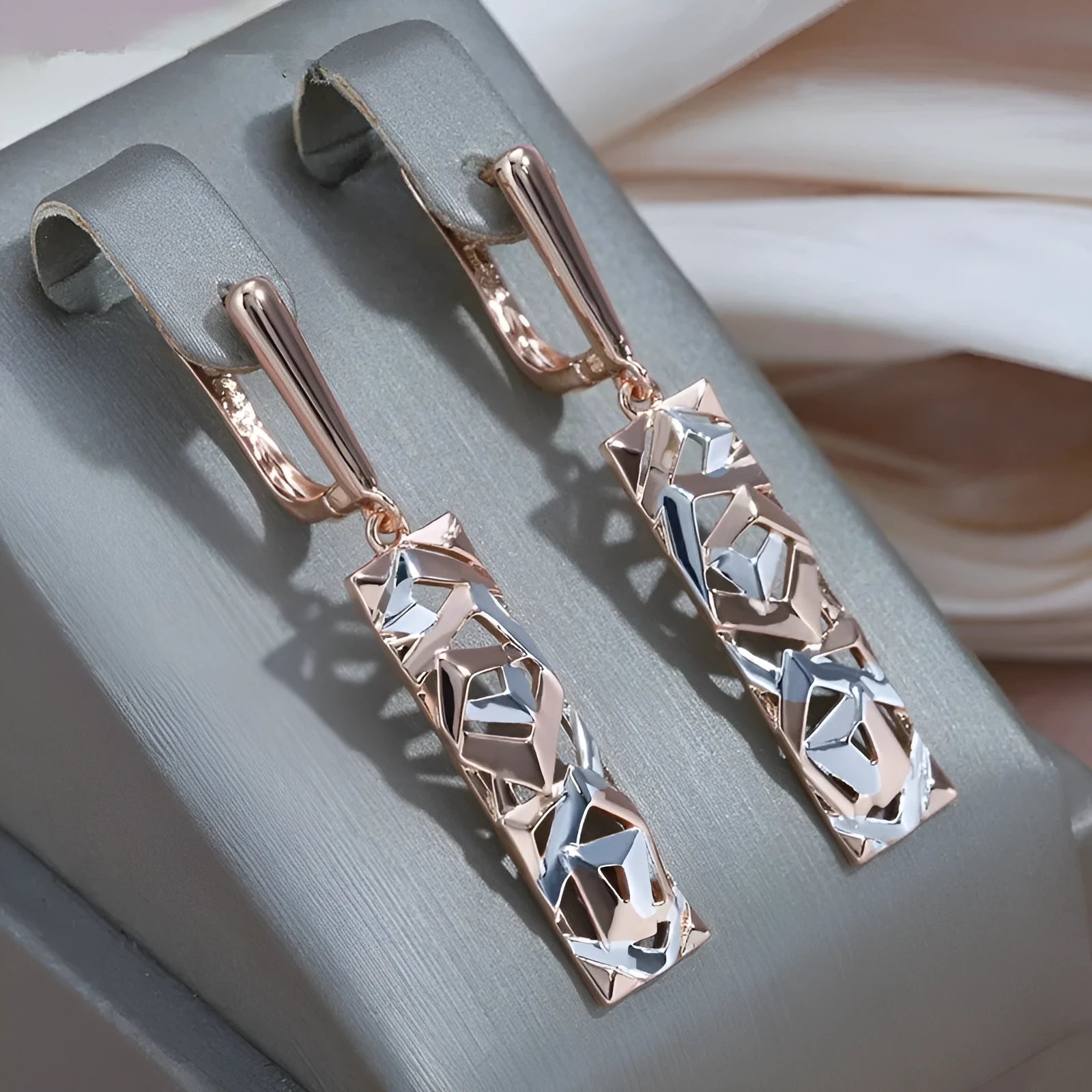 Rectangle hollow stud earrings with two-tone electroplated finish geometric design