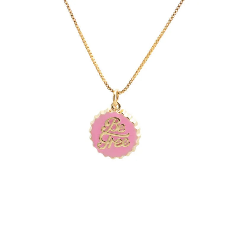 Copper bottle cap pendant necklace on a 40cm box chain with an 18K gold electroplated finish.