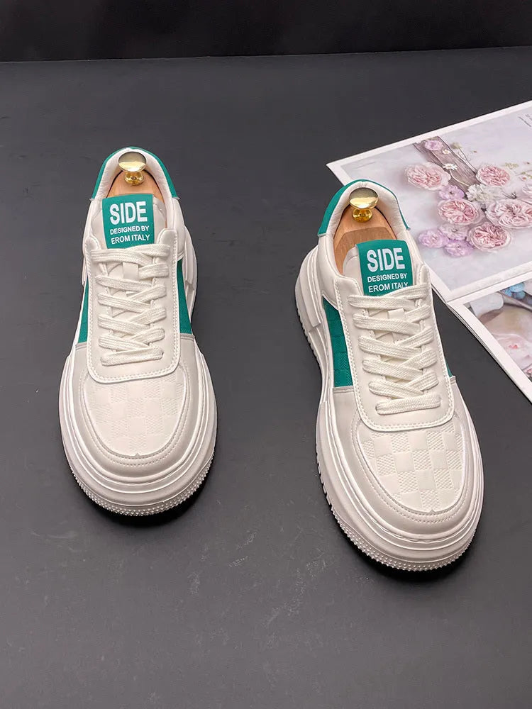 Casual unisex shoes in white with black or green accents, cloth upper with rubber foam sole