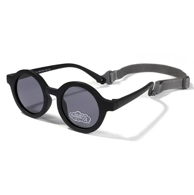 Children's round sunglasses for 0-3 year olds with UV400 protection, shown in a selection of colours.