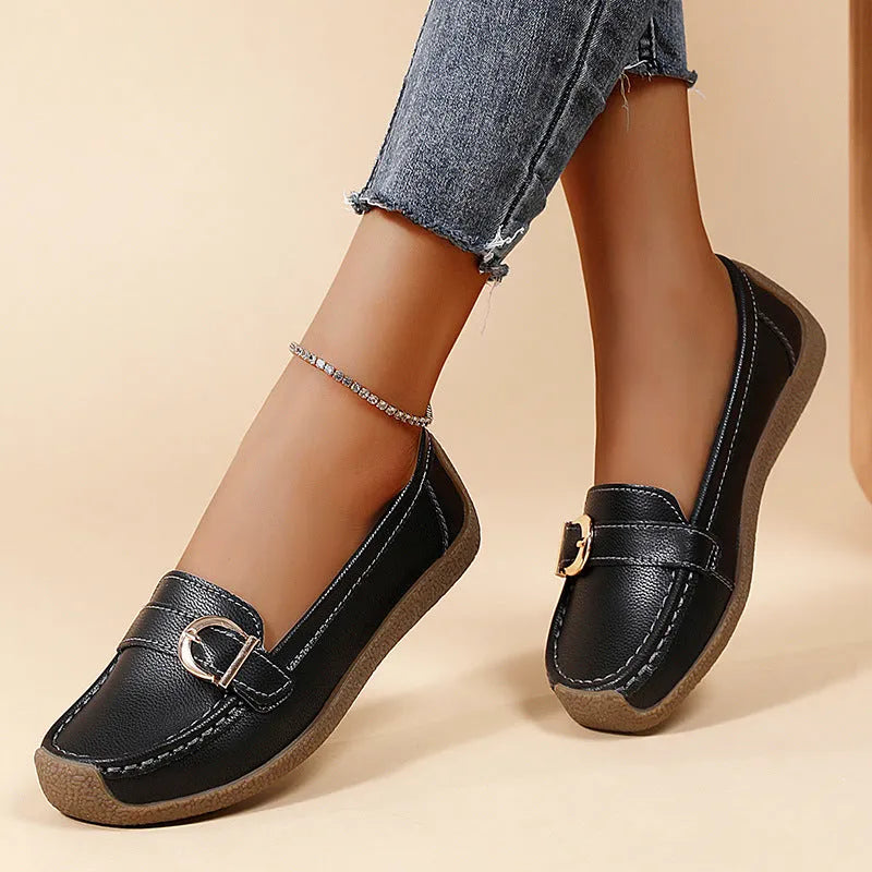 Women's beige casual loafers with a round toe and shallow slip-on design on a soft beef tendon sole.