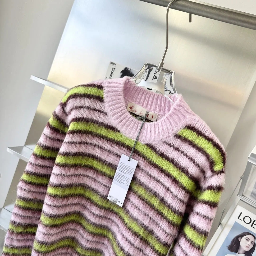 Pink wool knitted women's cardigan showing both round-neck pullover and open cardigan styles