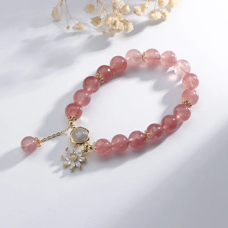 Korean style strawberry quartz bracelet with floral charm and silver accents