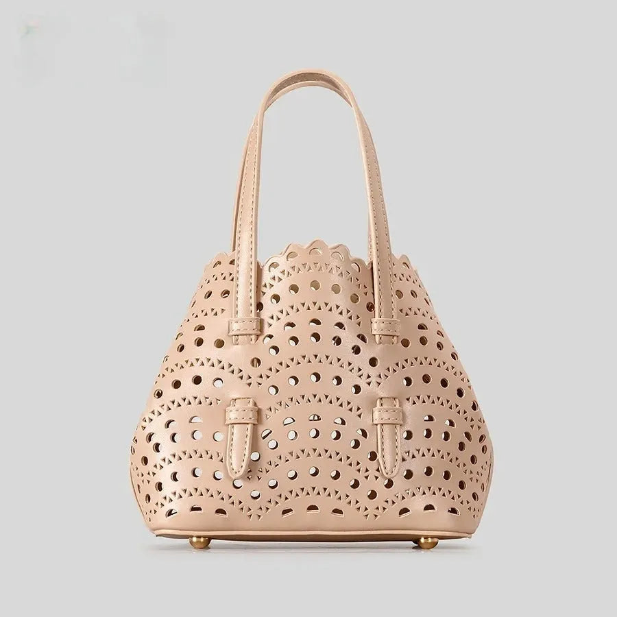 Hollow carved PU messenger bag with three shoulder straps in horizontal square shape