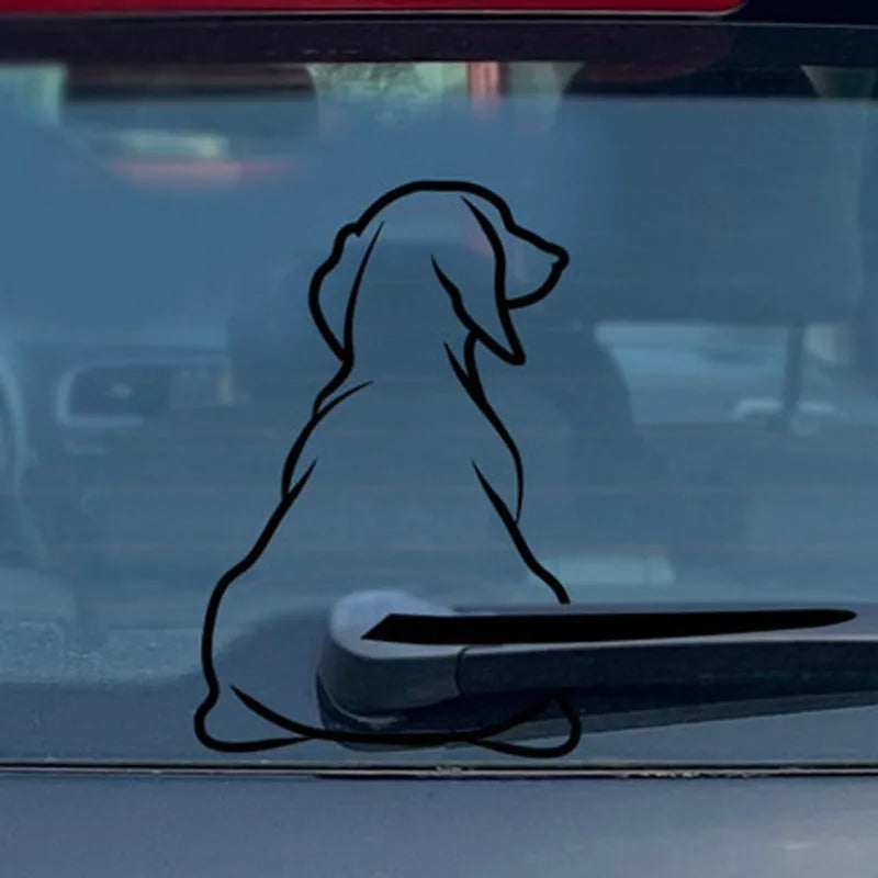 Cartoon dog car rear window sticker with wiper motion tail in black and white options.