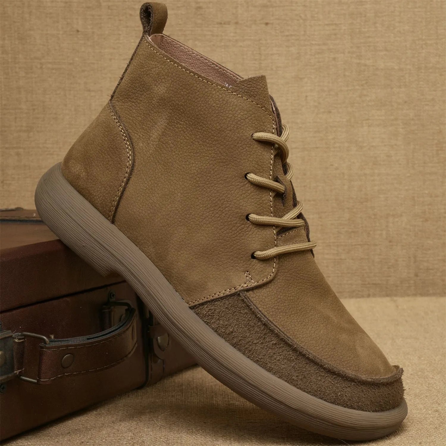 Women's grey genuine leather Martin boots with wedge heel and lace-up front.