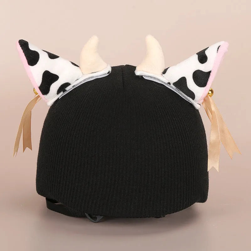 A plush fabric cartoon helmet cover set for adults, showing character designs like a bear and dinosaur for cosplay.