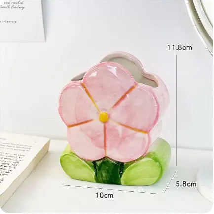 Ceramic flower pen holder storage box with floral patterns in blue, pink and purple colour variations