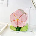 Ceramic flower pen holder storage box with floral patterns in blue, pink and purple colour variations