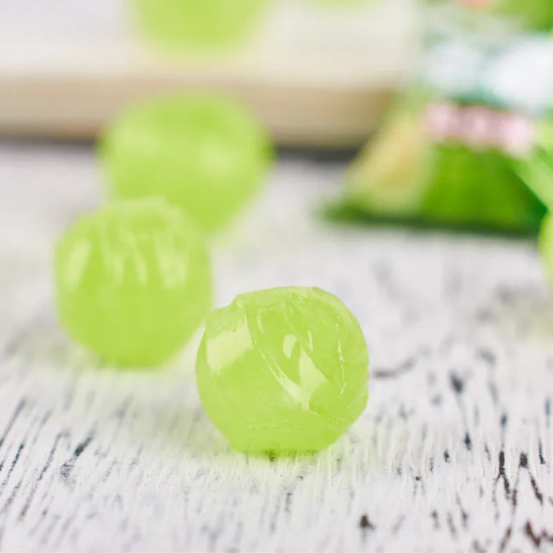 Bag of assorted hard candies: guava, plum, and tangerine peel flavours.