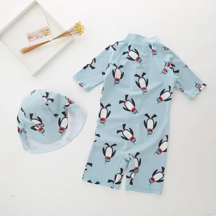 Boys' penguin print long sleeve one-piece swimsuit with matching swimming cap