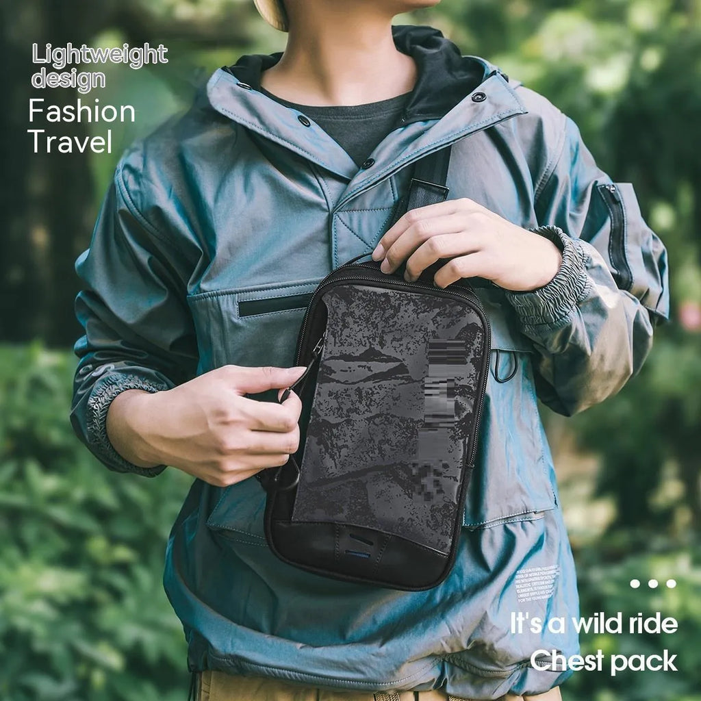 Casual black TPU chest pack with landscape pattern, soft handle, and single shoulder strap showing internal mobile phone pocket