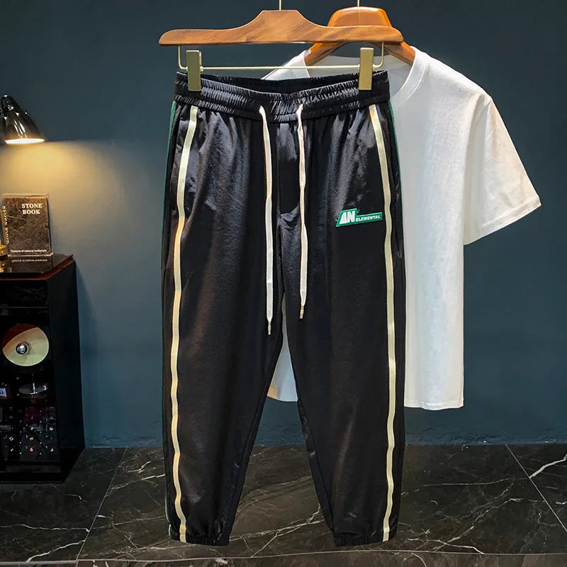 Men's cotton harem pants in black or grey with mid waist and trousers length