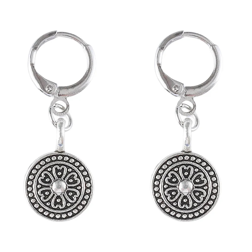 Geometric round women's earrings with distressed ethnic print in retro bohemian style.