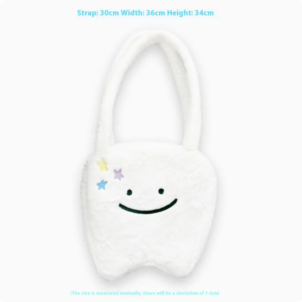 White plush shoulder tote bag with large tooth pattern decoration and zipper closure