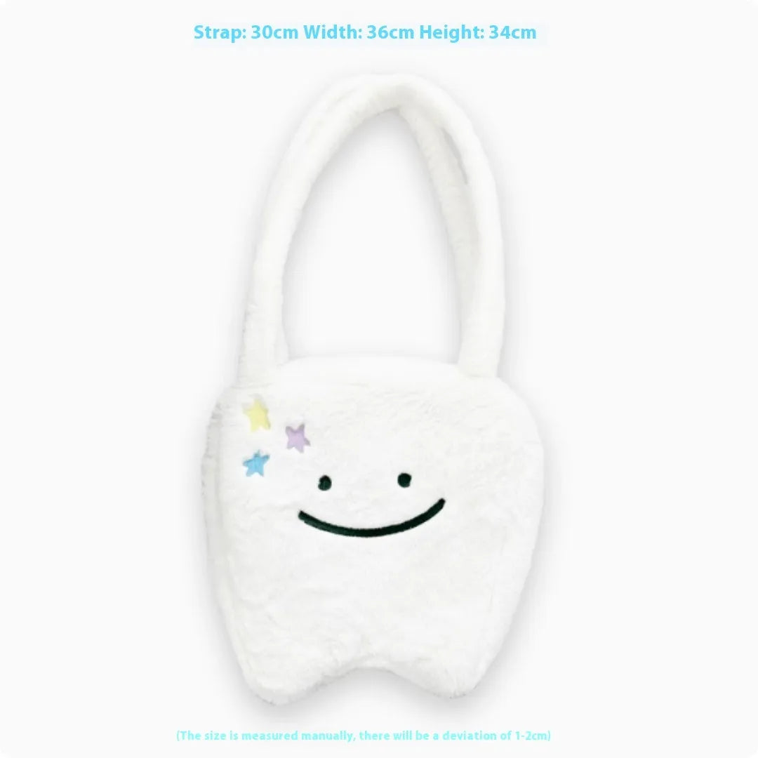 White plush shoulder tote bag with large tooth pattern decoration and zipper closure