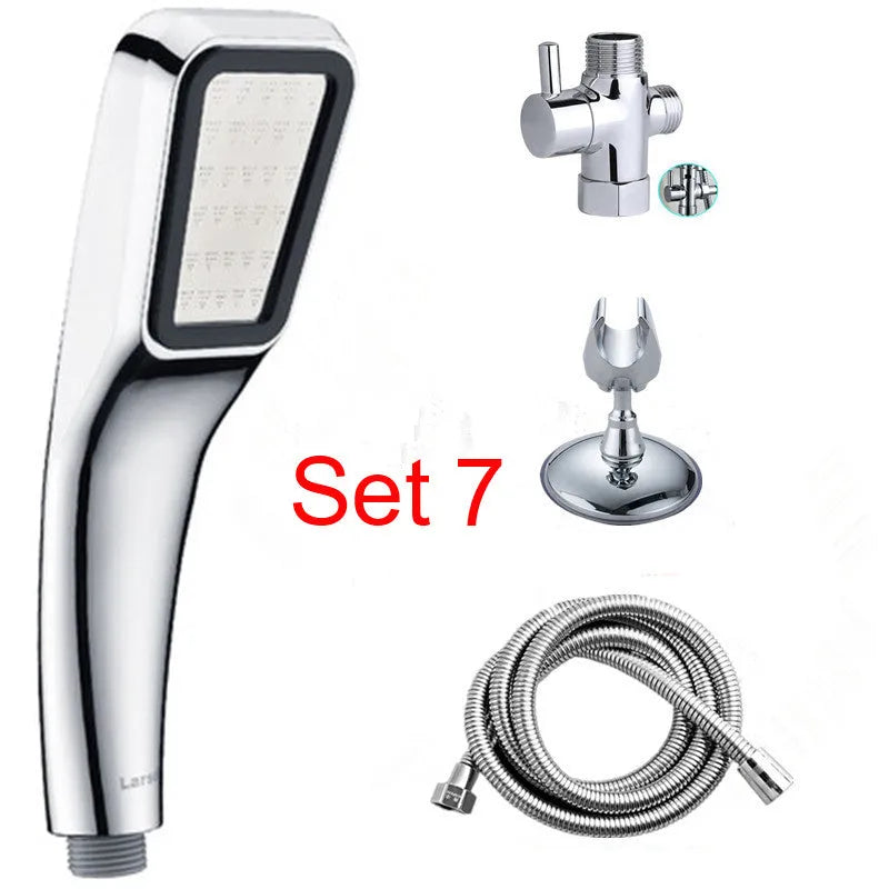 Orange hand-held rain shower set with wall bracket and connection hose