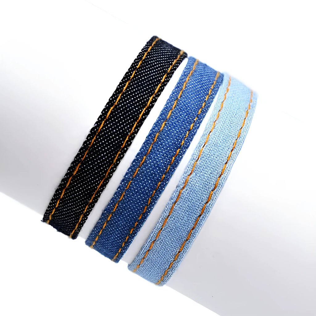 Denim fabric bracelet carrying strap with mixed materials, unisex design for travel