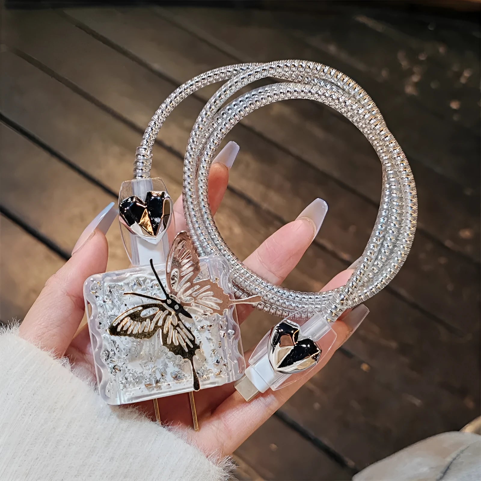 Three-dimensional butterfly USB cable protection sleeve in silver foil for data cable organisation