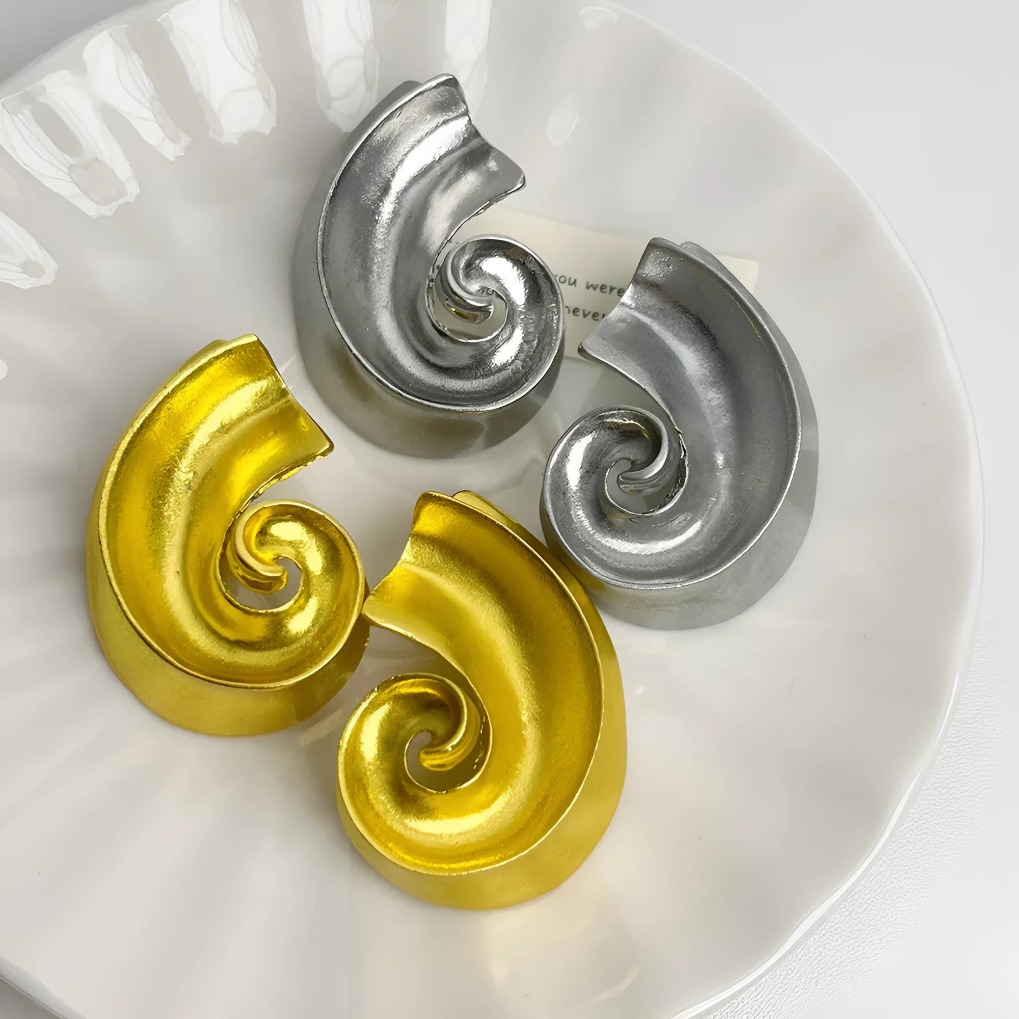 Retro geometric alloy ear studs in gold or silver, measuring 5cm with electroplated finish