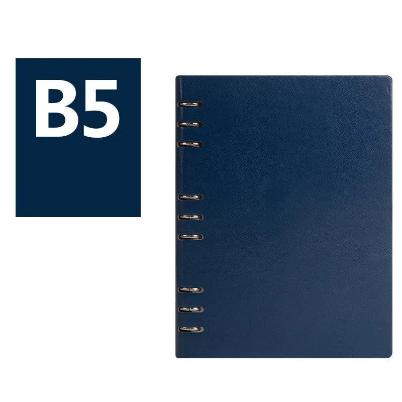 Simple business notebook with imitation leather cover showing loose-leaf binding and beige road forest paper